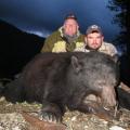 Chris's son Ed with his huge boar just before dark.